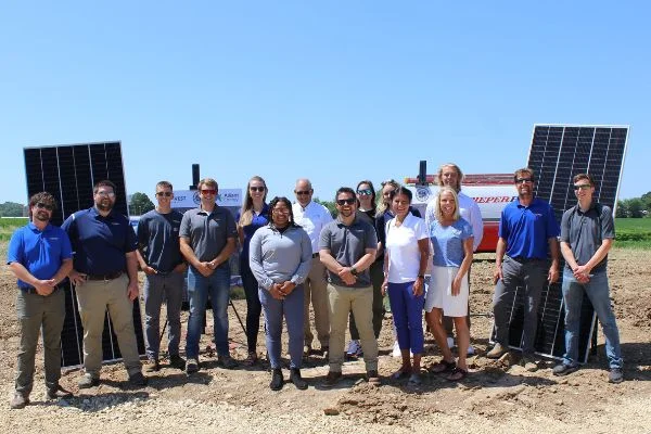 SunVest team posing with panels